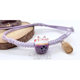 Lila cicás zsinóros karkötő